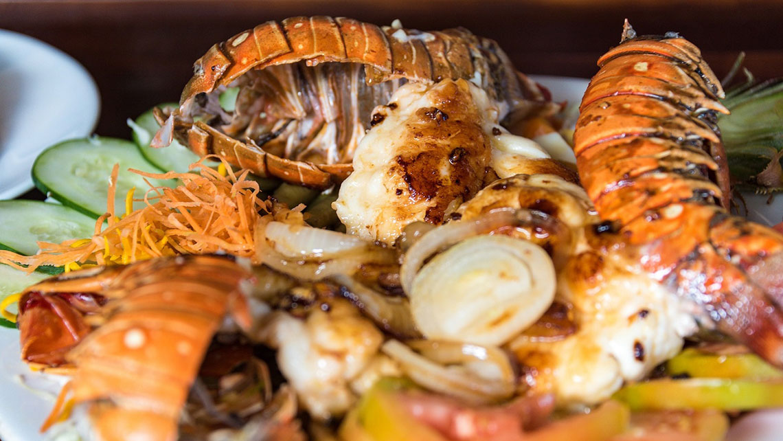 A plate of fresh seafood with salad 