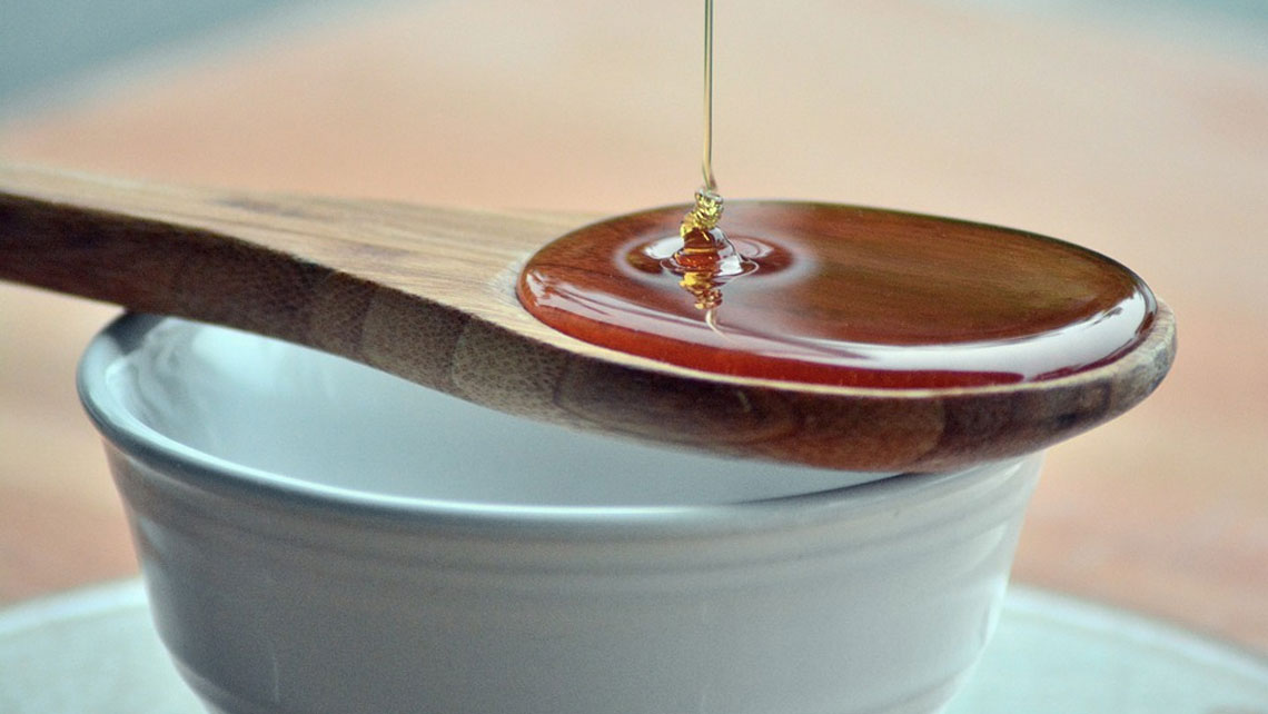 Honey on a wooden spoon