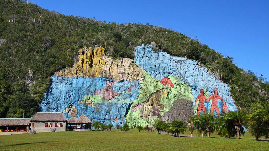 A gigantic work of art painted on the side of one of the mogote hills