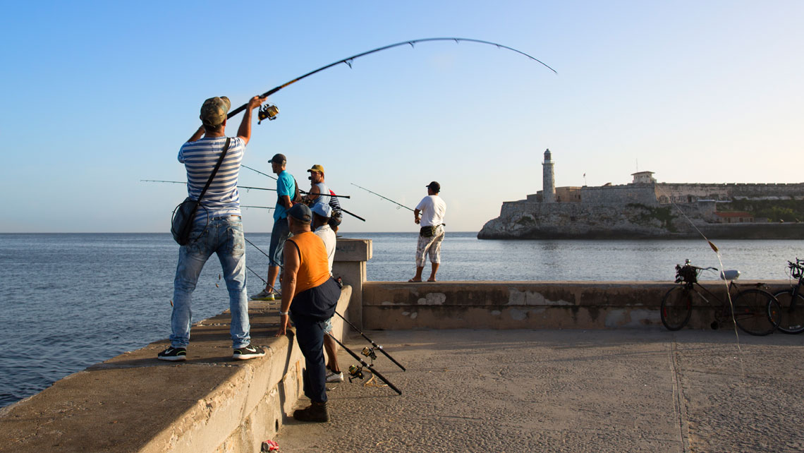 Fishermen on Havana seawall