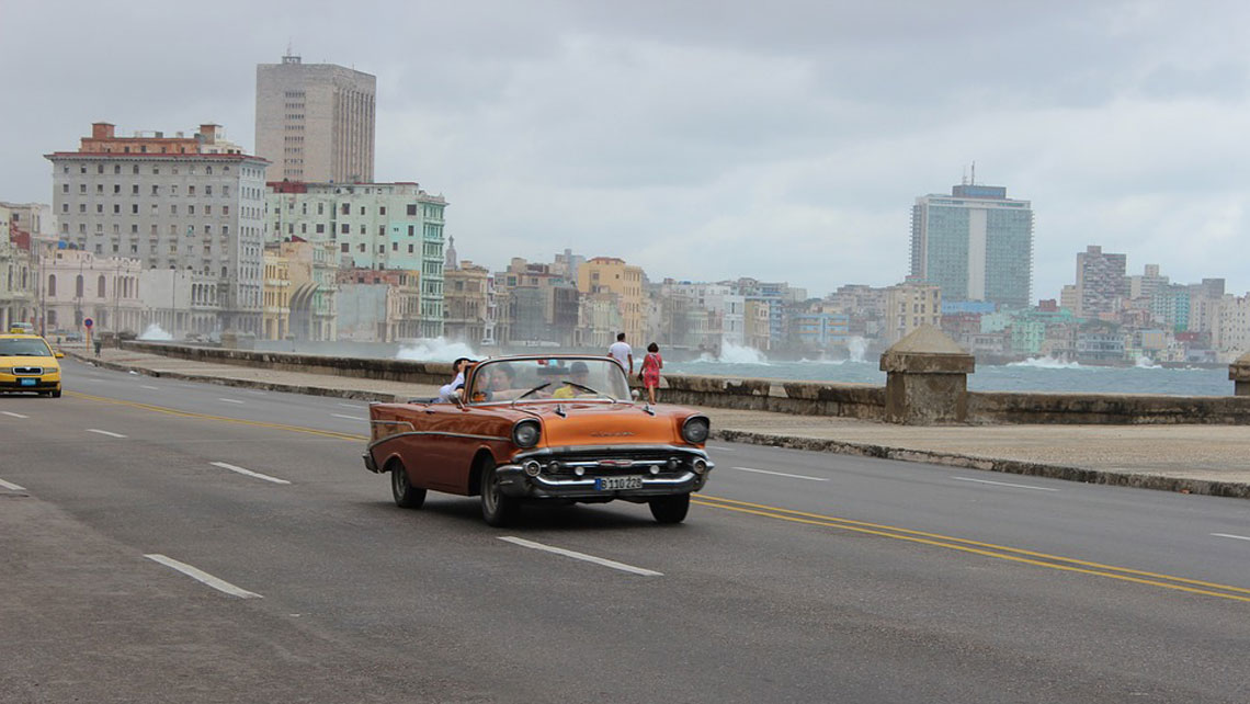 The sea burst into a mist of salty spray over El Malecon