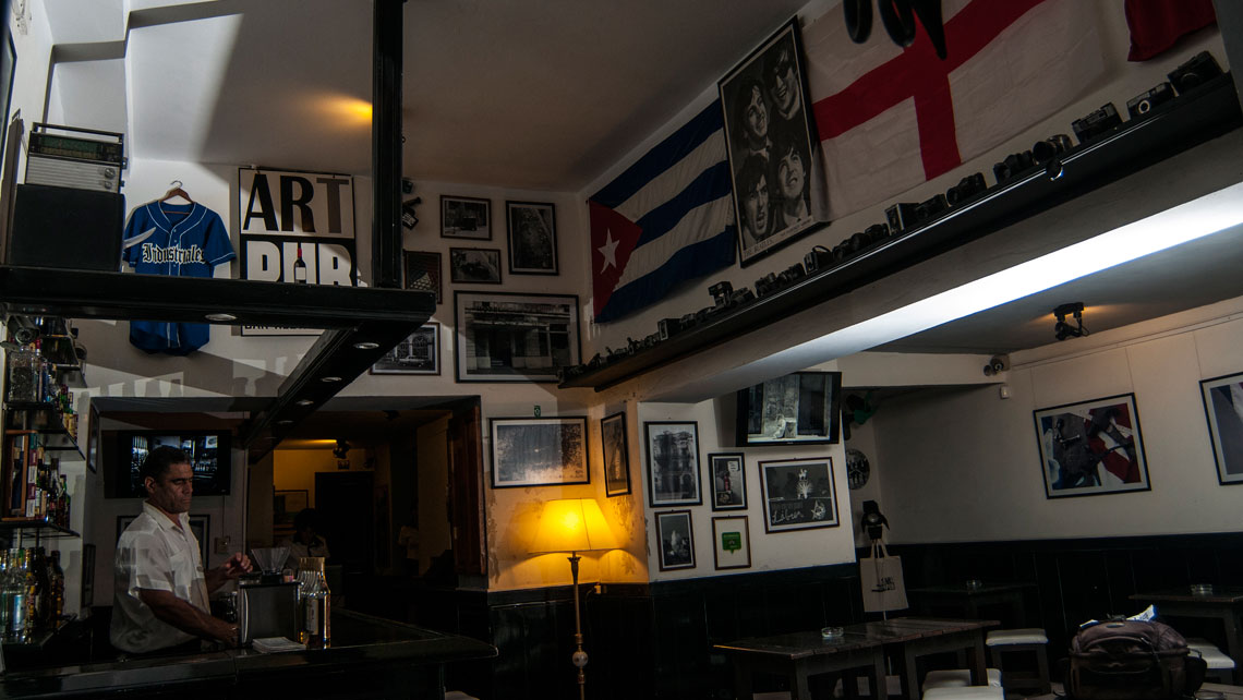 Cuban photography and international memorabilia on the walls of Art Pub