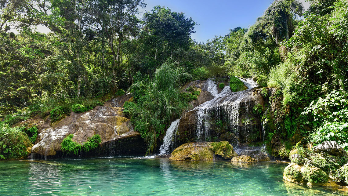 Jade-green waters of El Nicho waterfalls