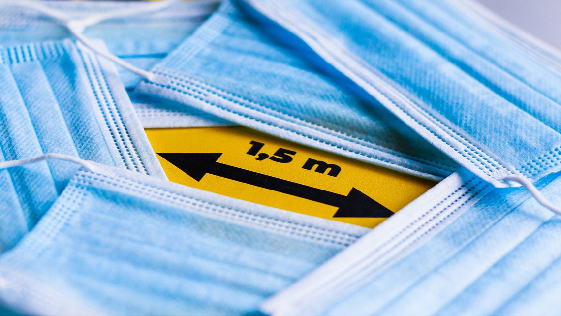 Face masks with social distancing signage used during Covid-19