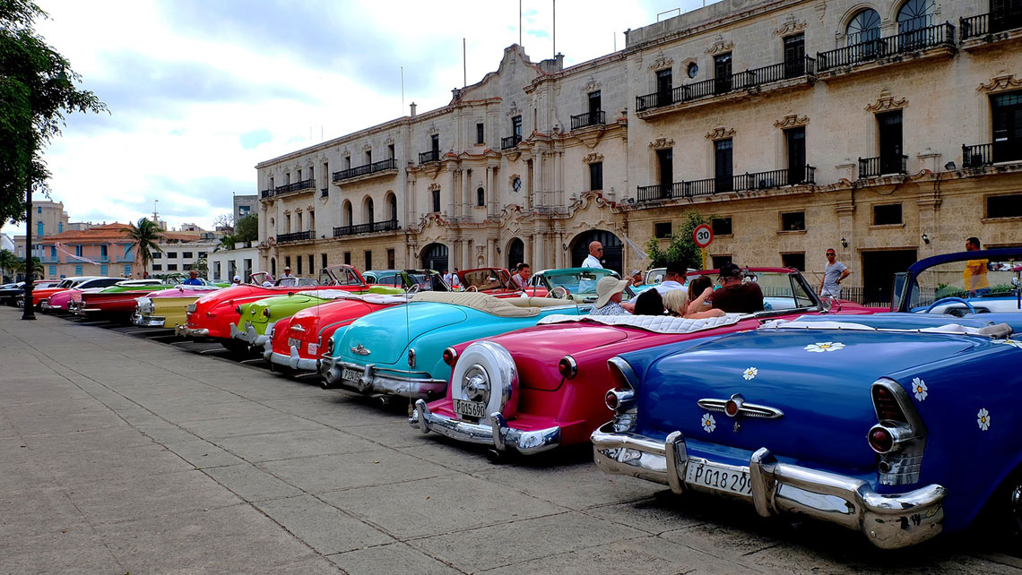 Parking lot full of 40s and 50s American classic cars 