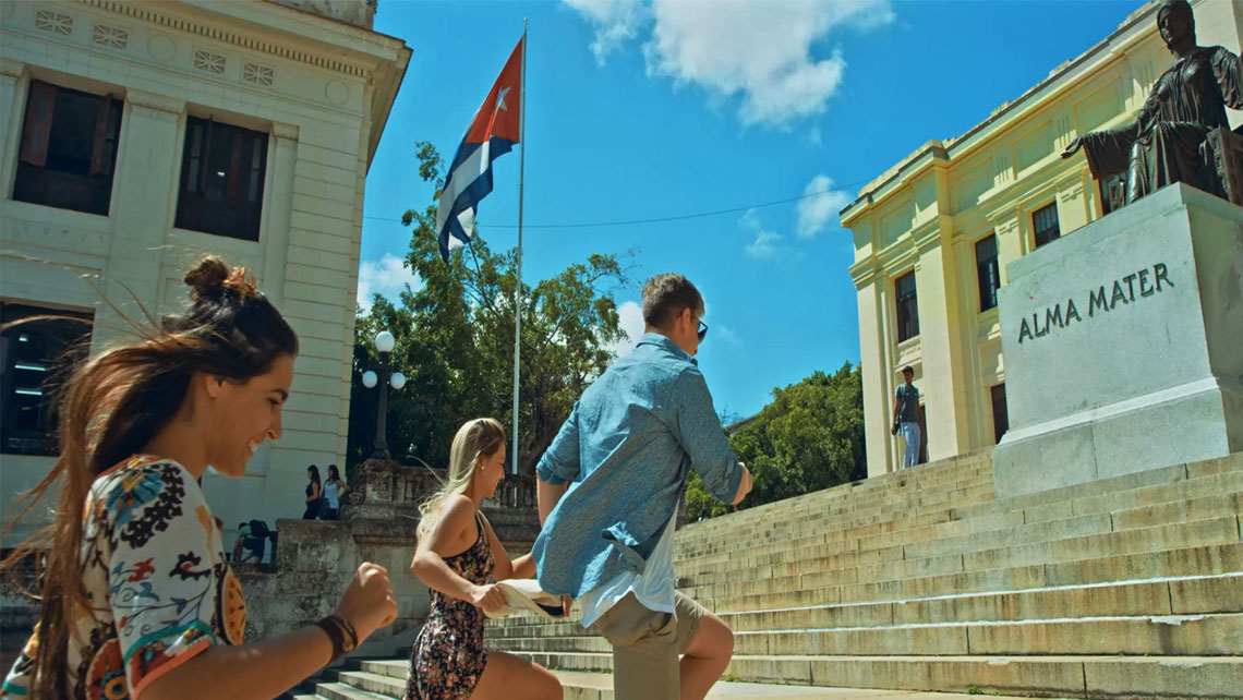 Young people walking on the stairs leading to University of Habana