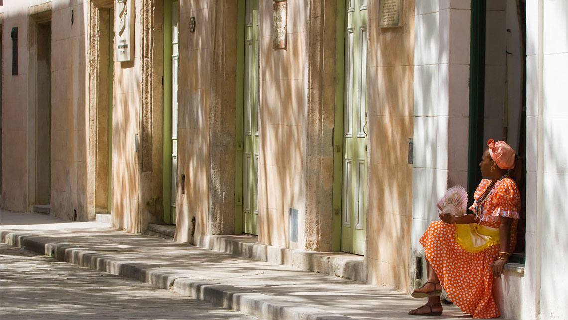 Cuban woman on street corner