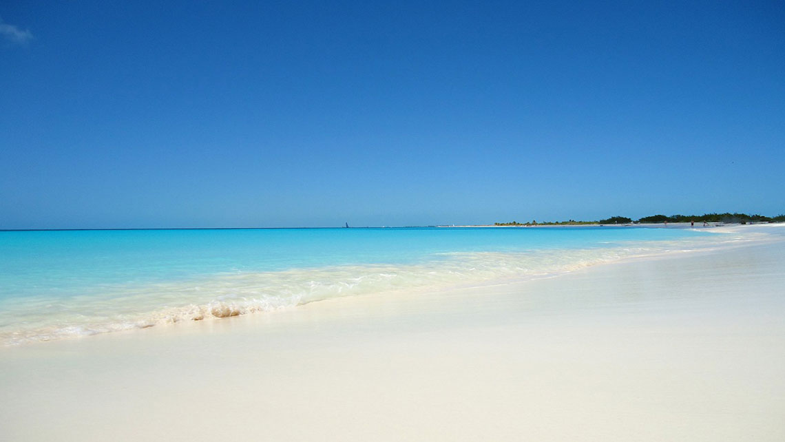 White sands and clear waters of Playa Cazonal in Santiago de Cuba