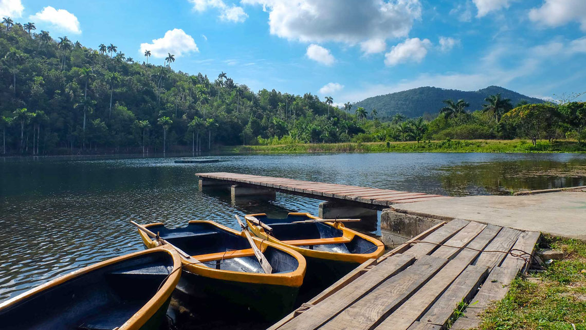 Boats by a smal pier in Las Terrazas