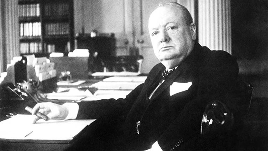 Wiston Churchill posing with a Cuban cigar 