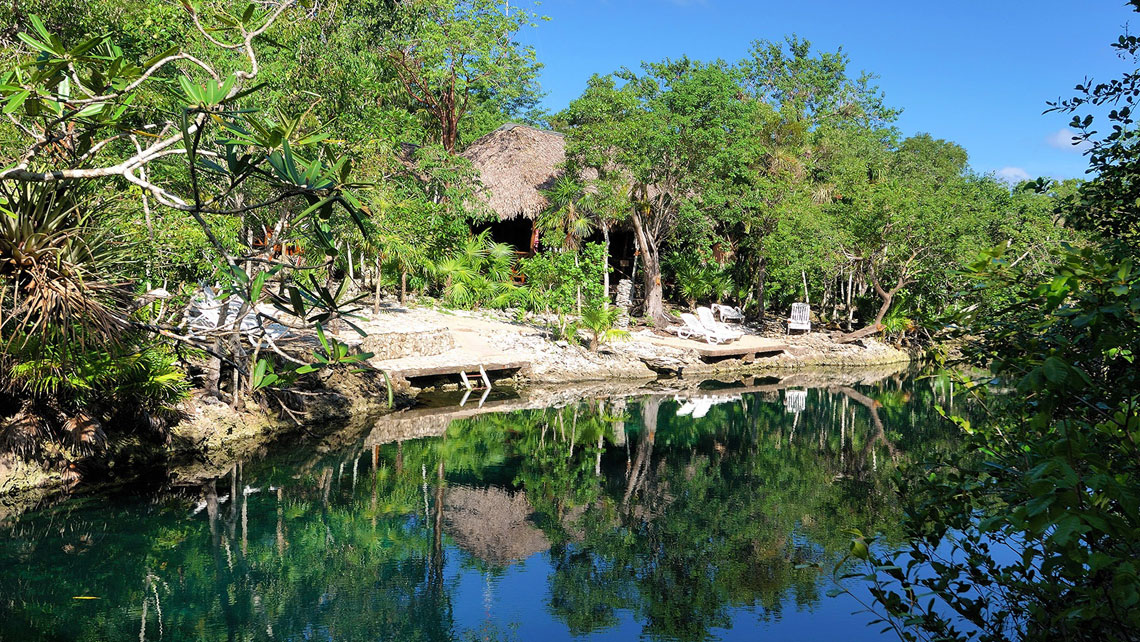 Clear, transparent waters of 'La Cueva de los Peces'