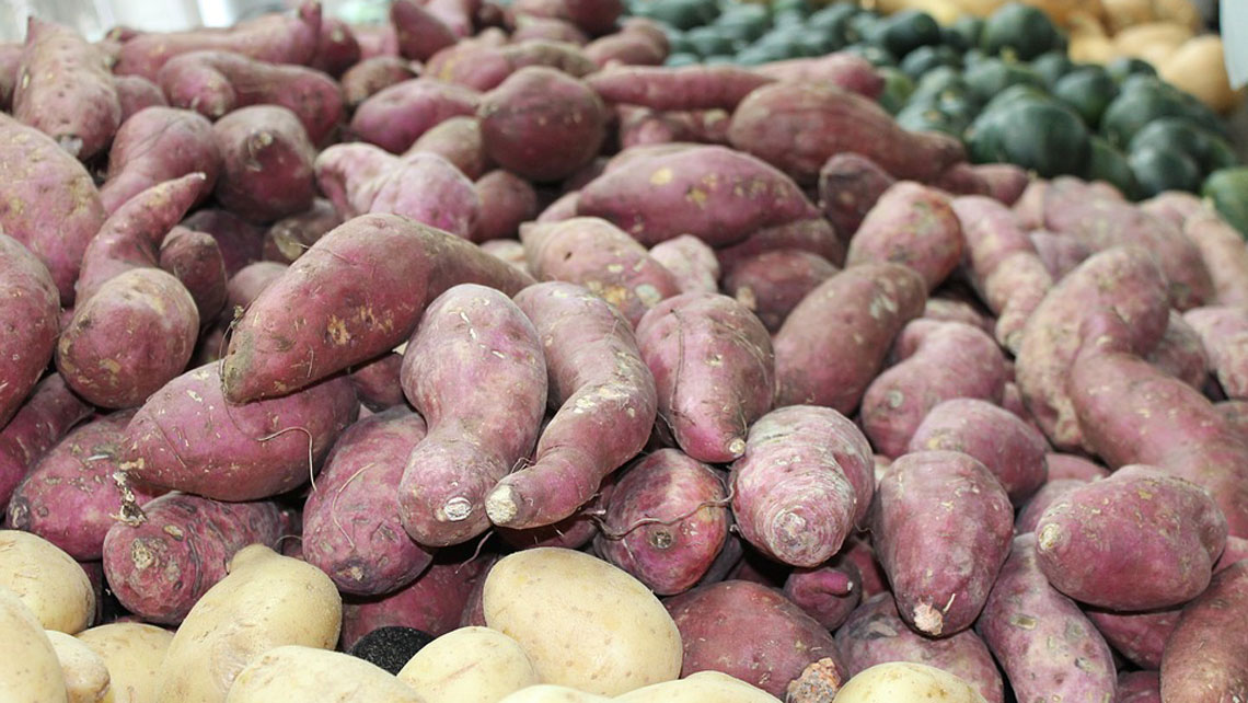 Sweet potatoes in a selling stand