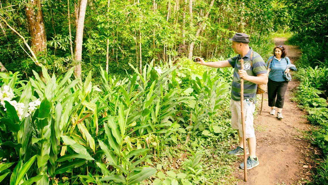 Turist walking in Desembarco del Granma National Park