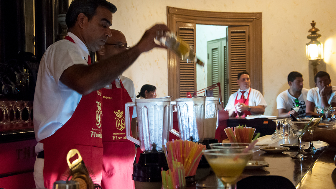 Bartender prepares a daiquiri in El Floridita, Old Havana, Cuba