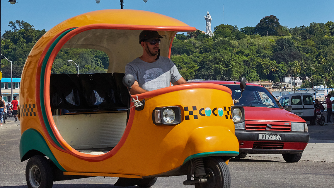 Coco taxi, a popular way for tourist to travel around Old Havana