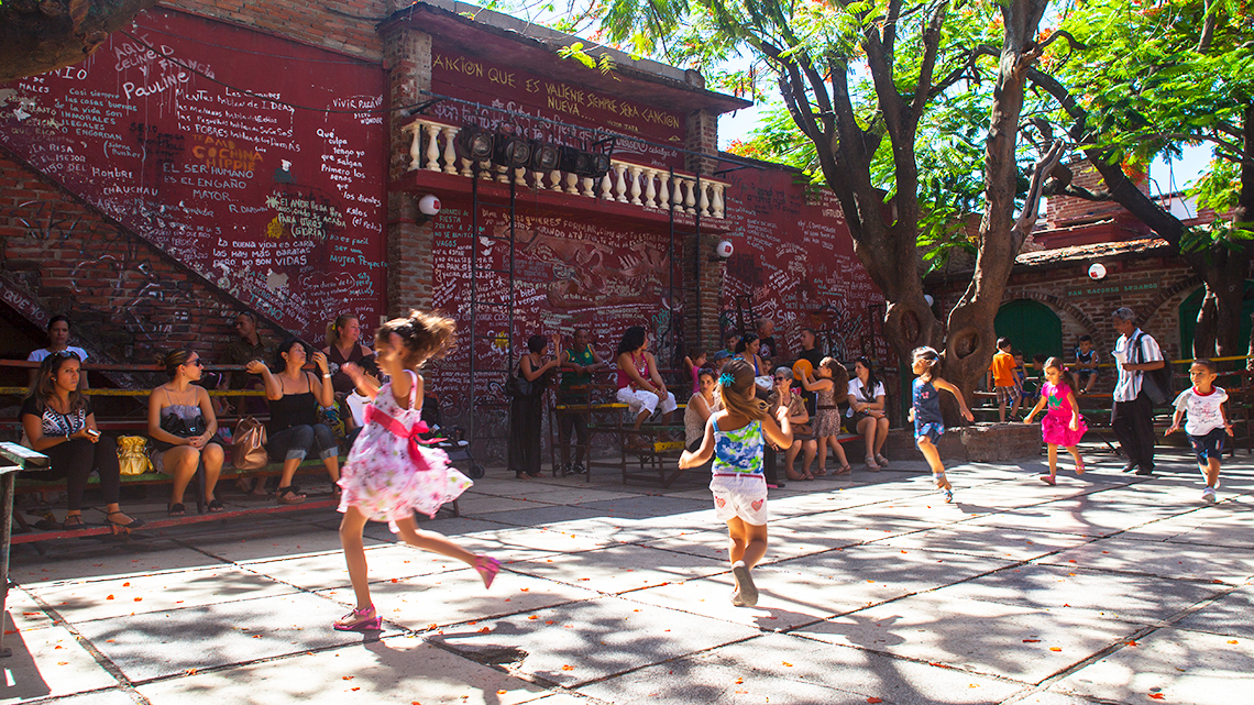 Children playing in El Mejunje, cultural centre in the heart of Santa Clara